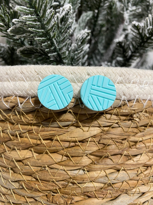 Blue carved stud earrings