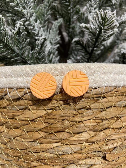 Orange carved stud earrings